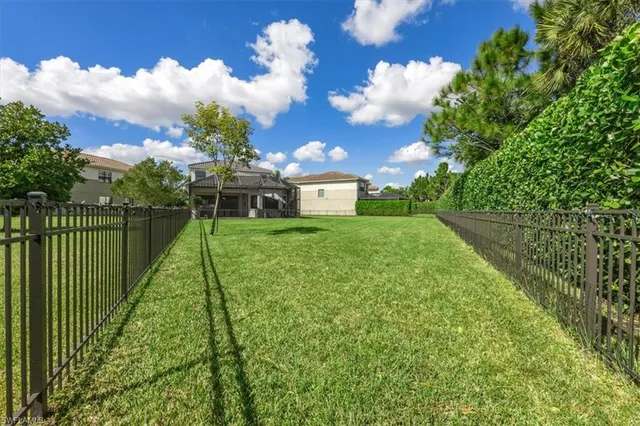 a view of a house with a big yard