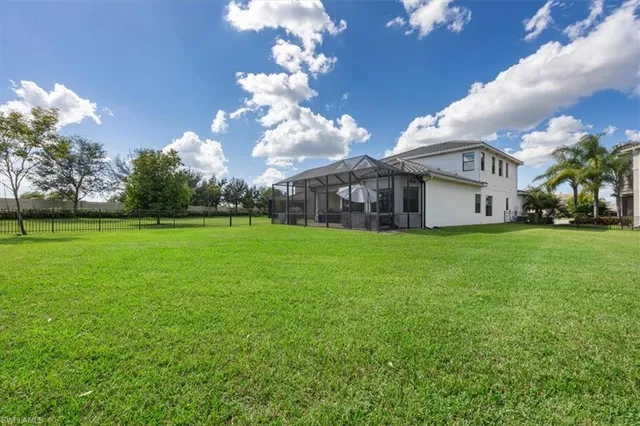 a view of a house with a big yard