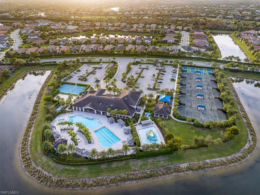 4172 Crescent Court Naples, FL 34119 - Photo 39 of 46 an aerial view of residential houses with outdoor space