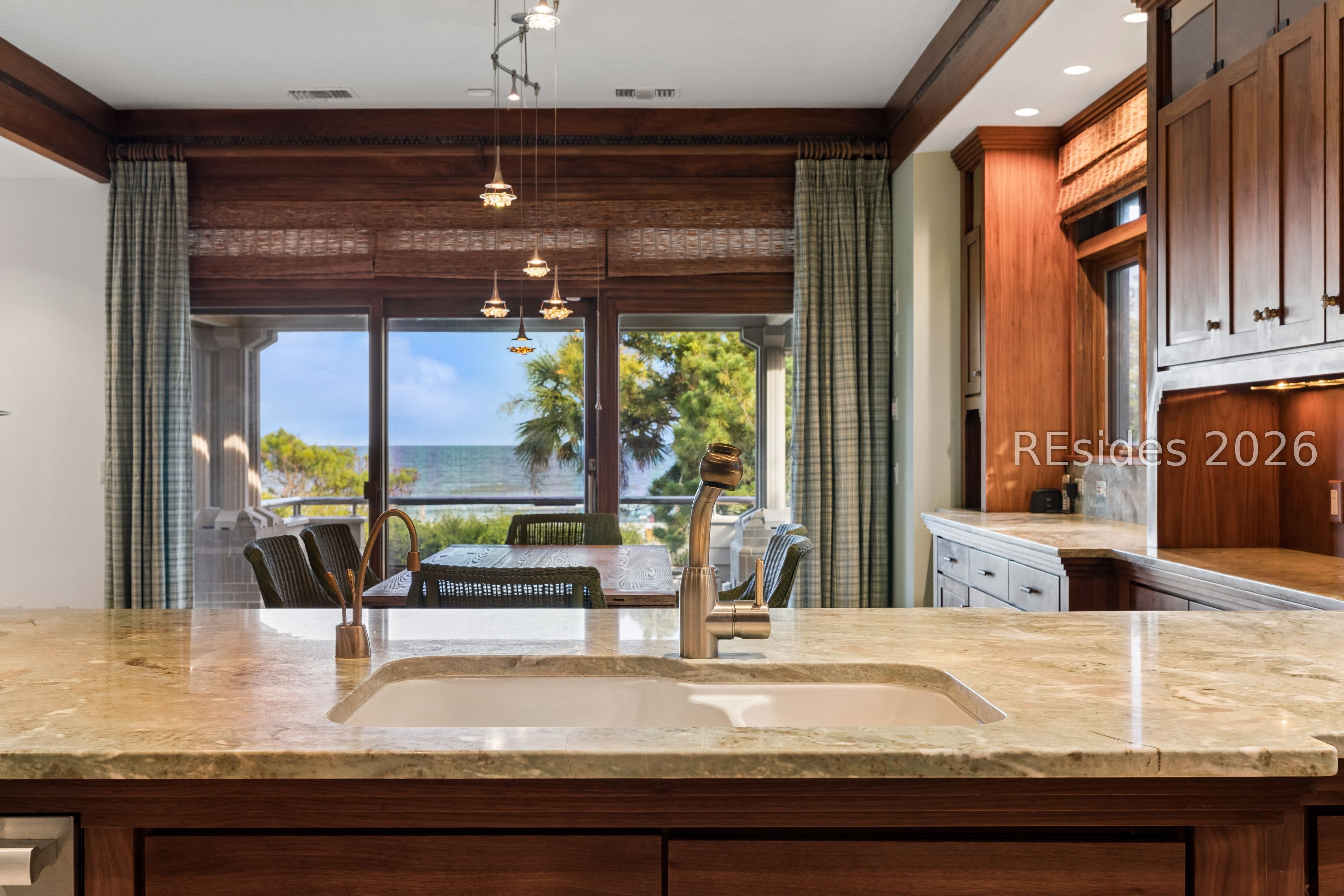 21 Red Cardinal Road Hilton Head Island, SC 29928 - Photo 15 of 54 Sink with instant hot water and view of ocean