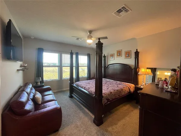 a room with furniture and a chandelier