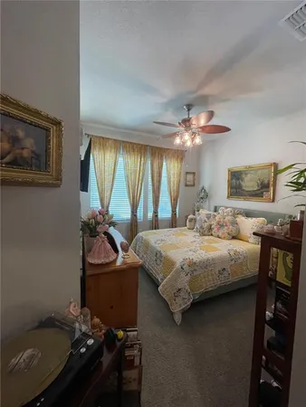 a view of a street with a bench in front of it