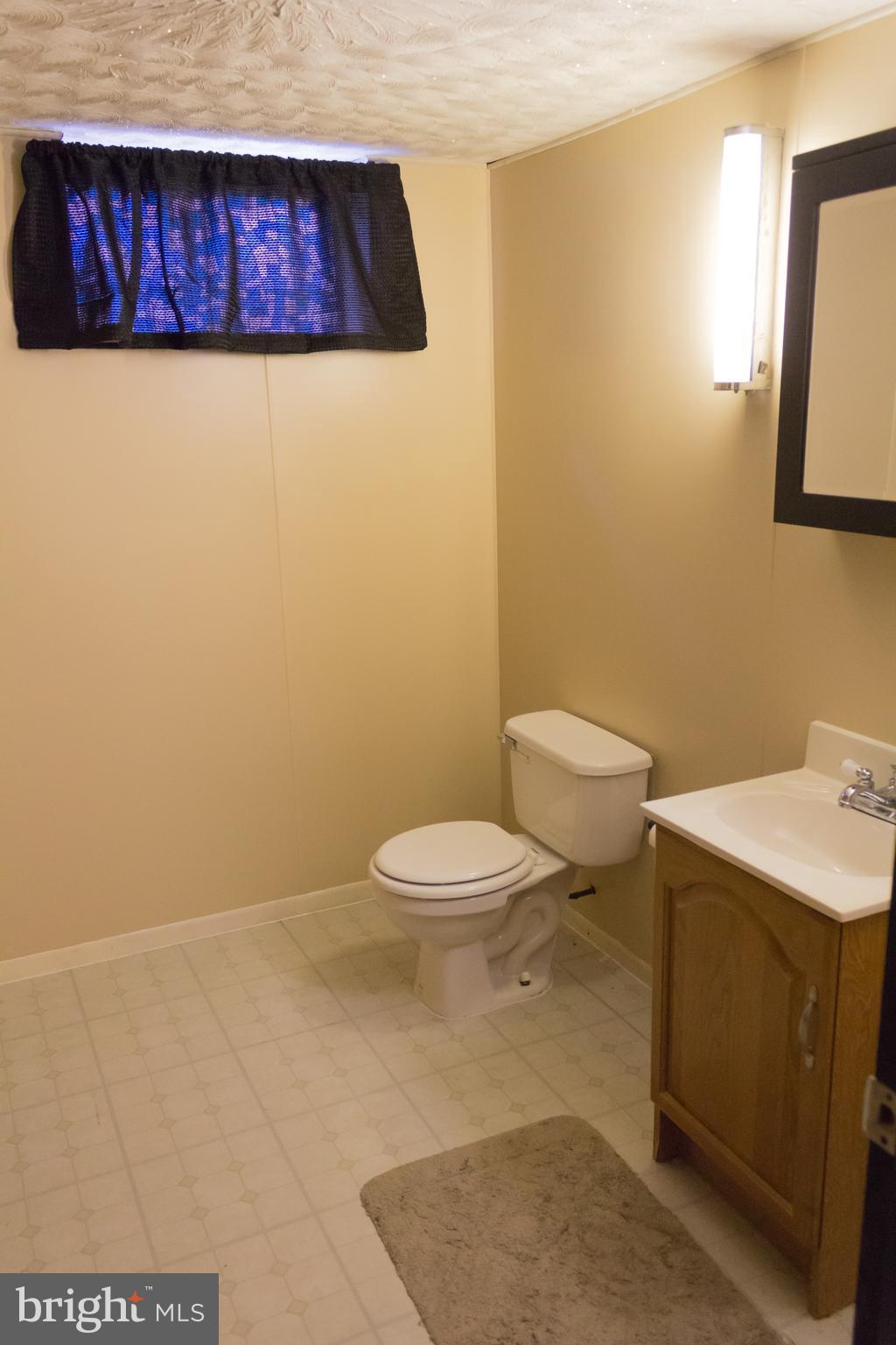 414 Holy Cross Road Baltimore, MD 21225 - Photo 21 of 23 Half Bath