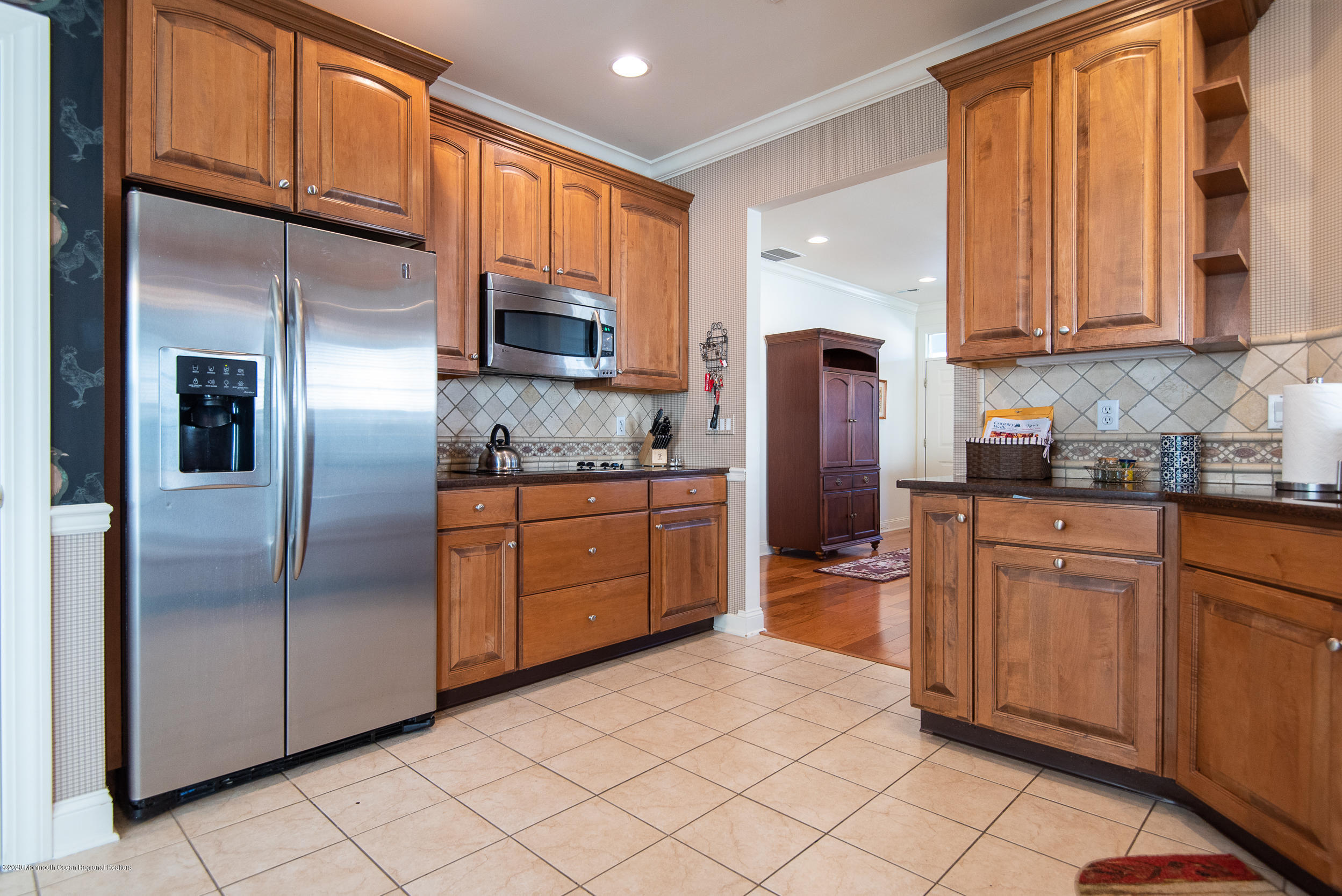 14 Tisdale Road Whiting, NJ 08759 - Photo 11 of 29 a kitchen with stainless steel appliances granite countertop a refrigerator sink and cabinets