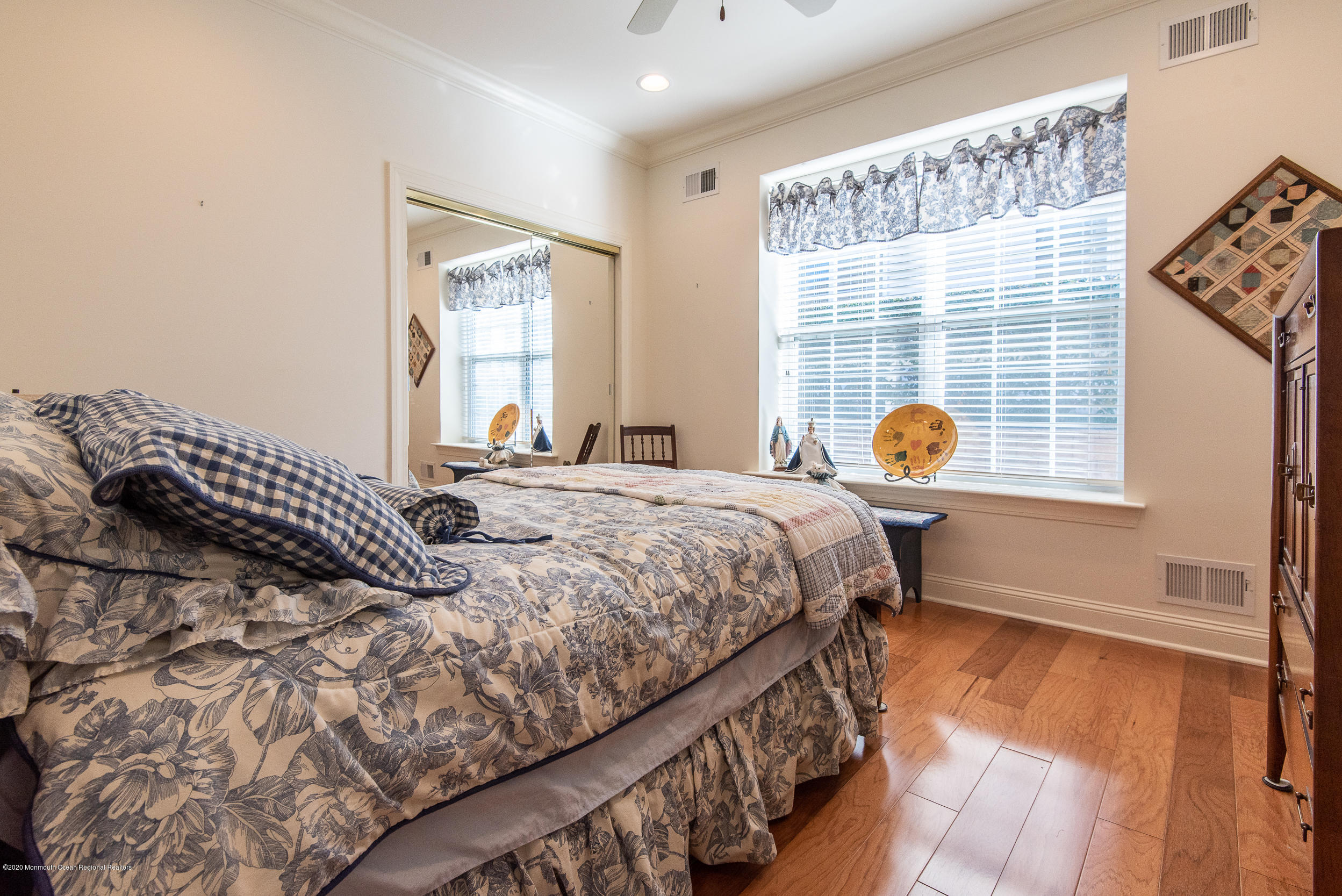 14 Tisdale Road Whiting, NJ 08759 - Photo 20 of 29 a bedroom with a bed and wooden floor