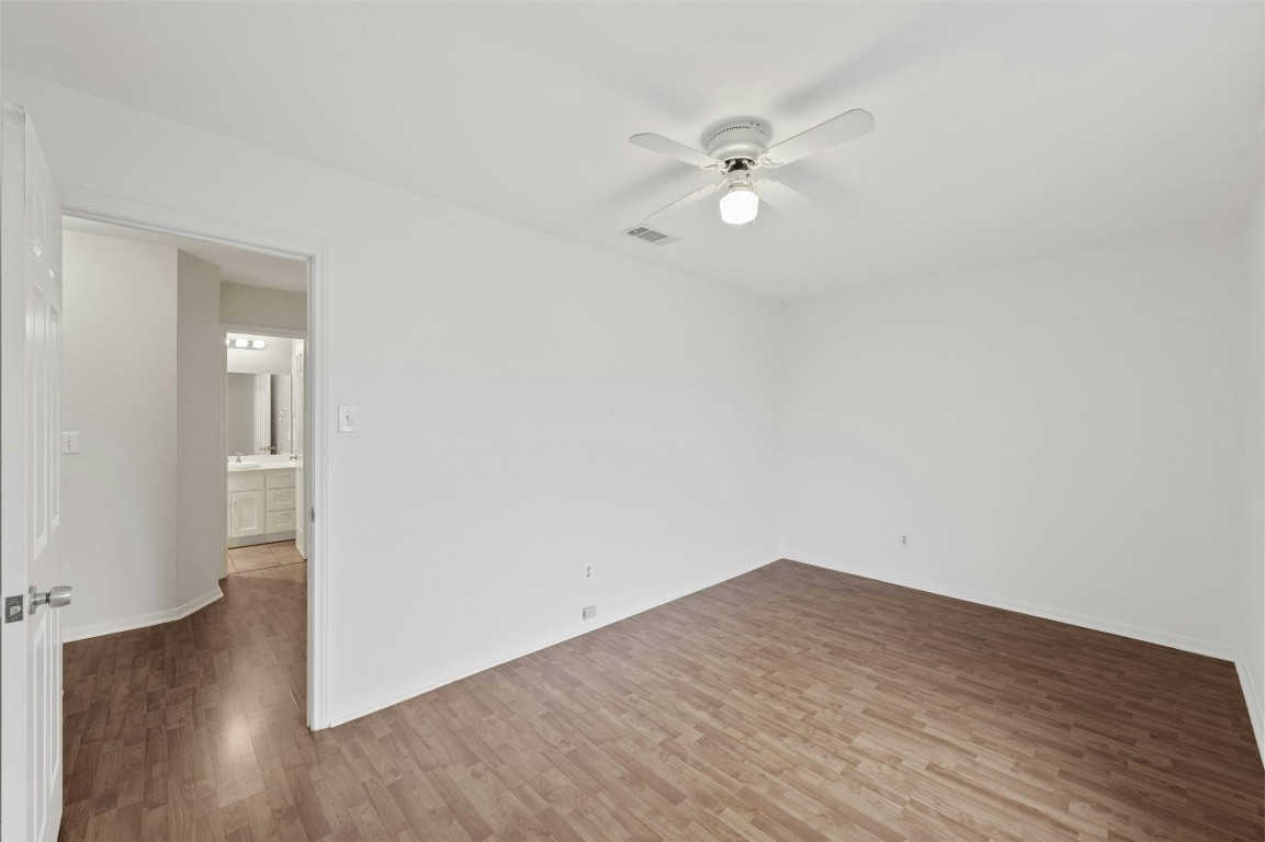1904 Goodrich Avenue, Unit 4 Austin, TX 78704 - Photo 30 of 31 a view of a room with wooden floor and closet