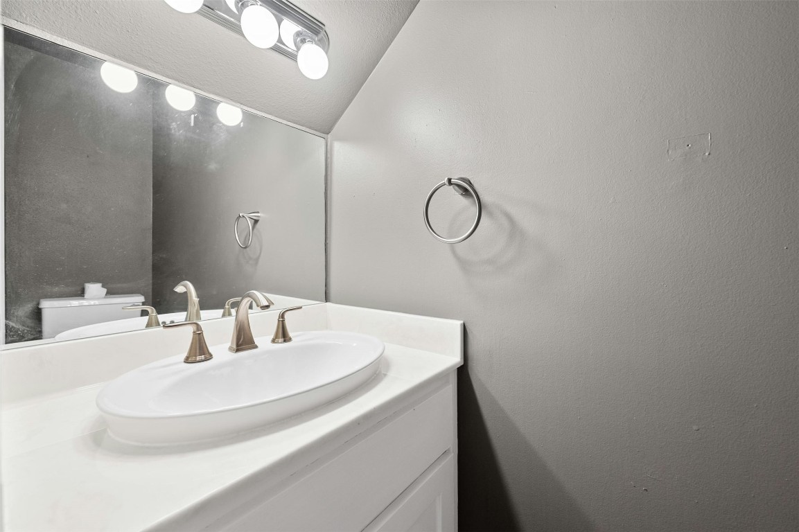 1904 Goodrich Avenue, Unit 4 Austin, TX 78704 - Photo 31 of 31 a bathroom with a sink and a mirror