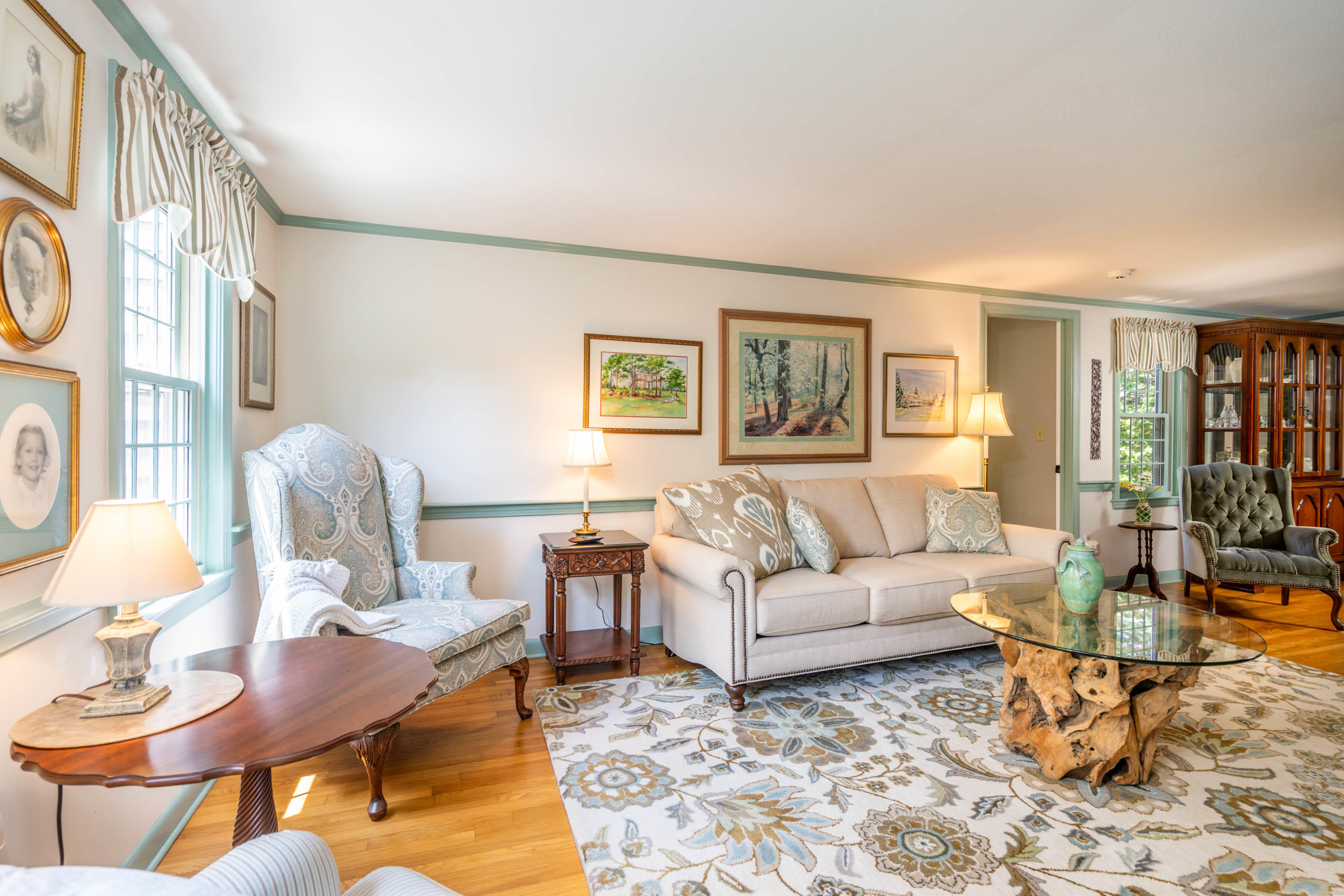 96 Breakwater Road Brewster, MA 02631 - Photo 11 of 16 a living room with furniture fireplace and a window