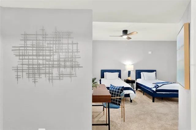 a bedroom with a bed and a view of bathroom