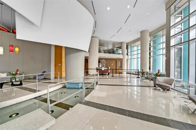 a view of a patio with couches table and chairs