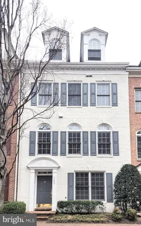 a front view of a building with large windows