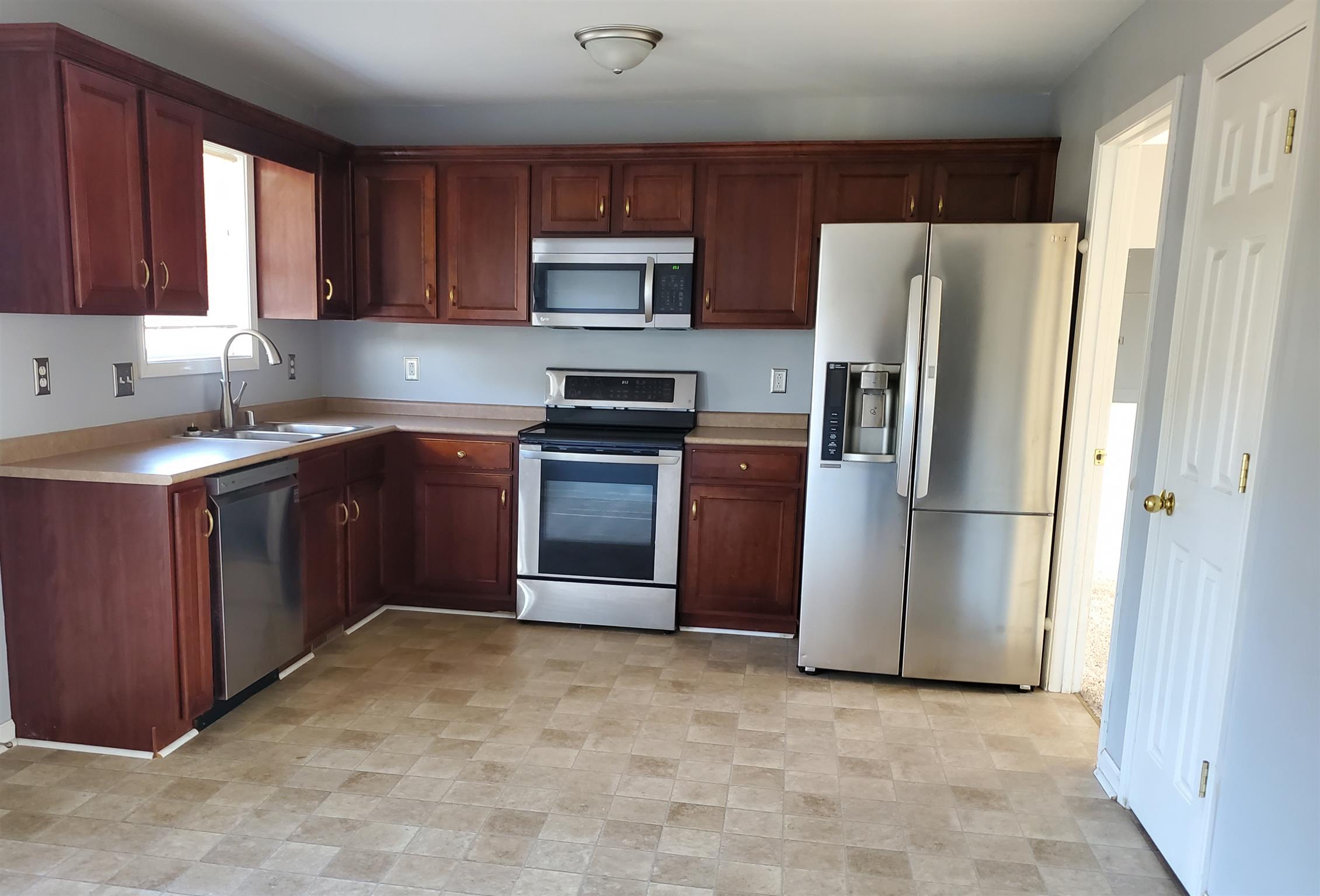 411 Filmore Road Oak Grove, KY 42262 - Photo 3 of 6 Kitchen with stainless steel appliances and open eat-in area