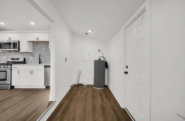 a view of kitchen and wooden floor