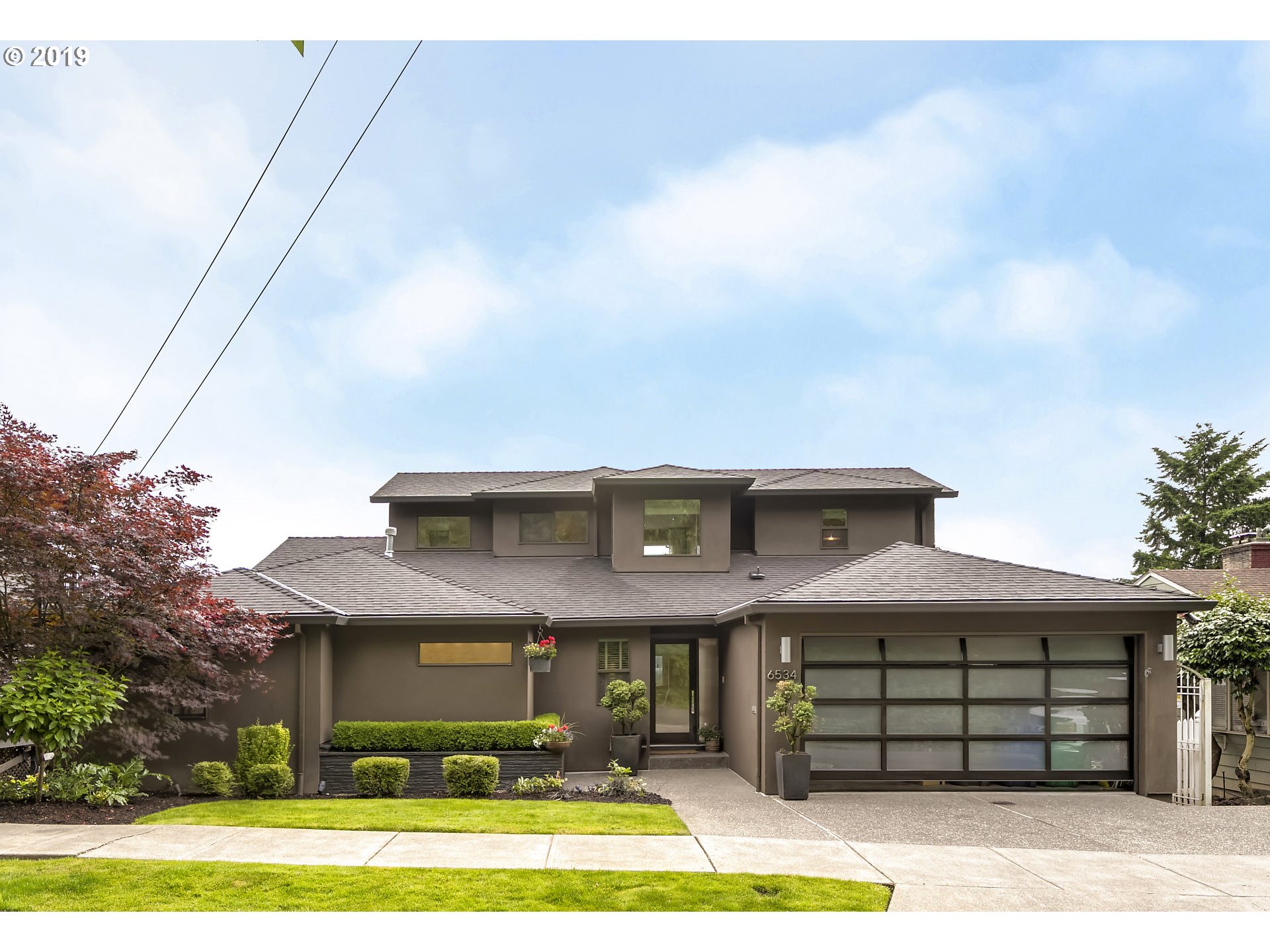 6534 Southwest View Point Terrace Portland, OR 97239 - Photo 1 of 29 a front view of a house