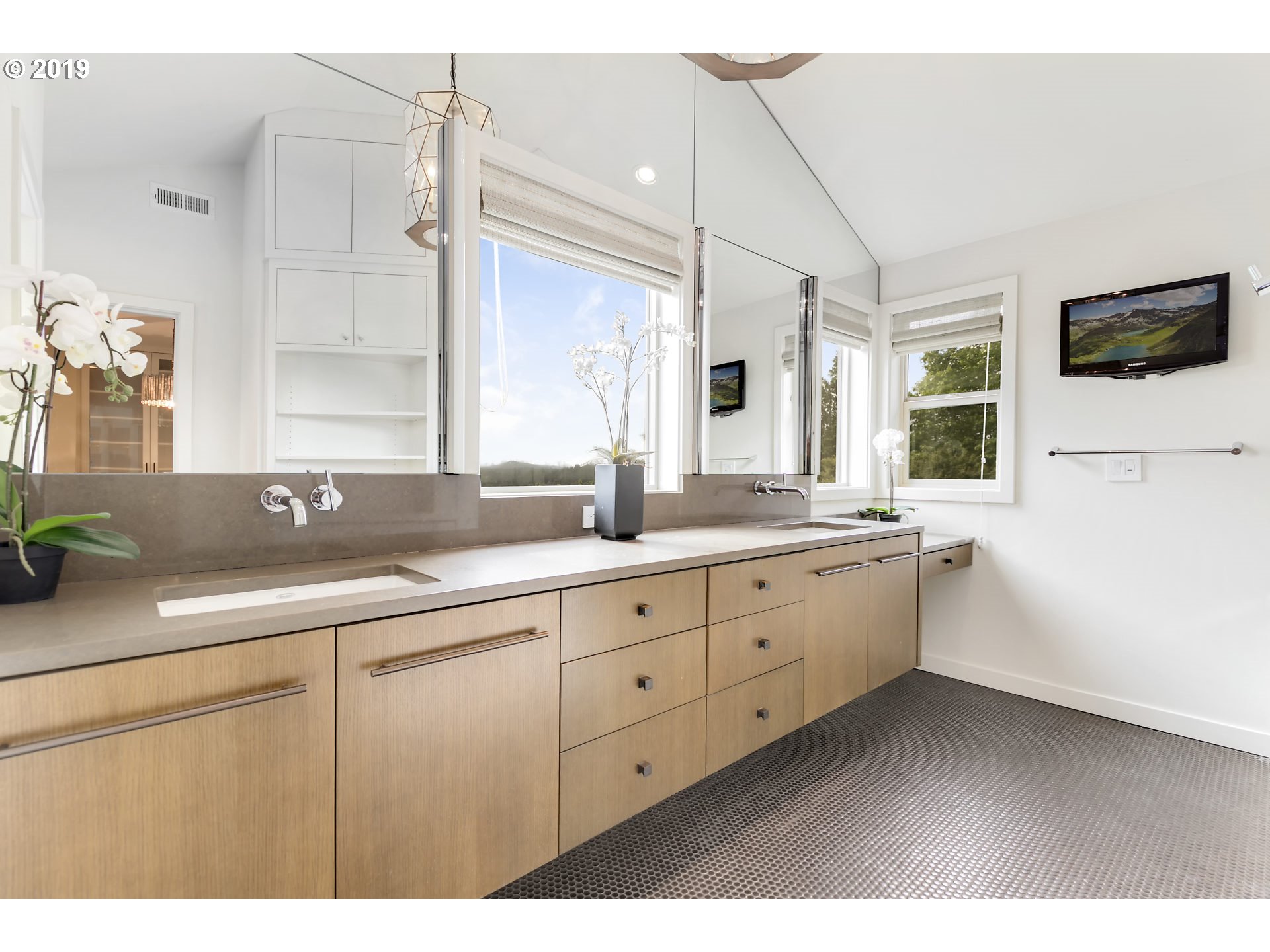 6534 Southwest View Point Terrace Portland, OR 97239 - Photo 15 of 29 a bathroom with a sink and mirror
