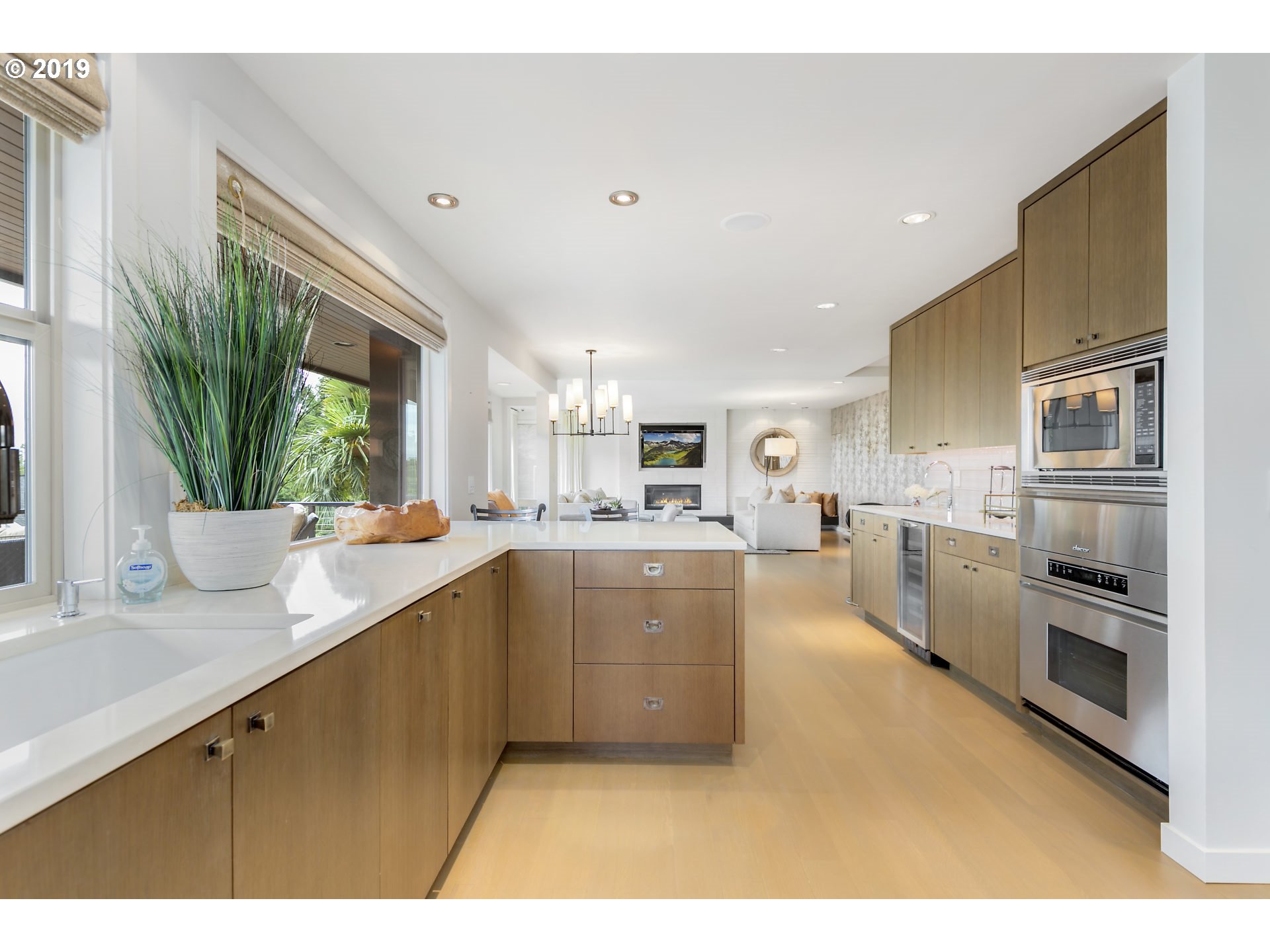 6534 Southwest View Point Terrace Portland, OR 97239 - Photo 8 of 29 a kitchen with a refrigerator and a sink