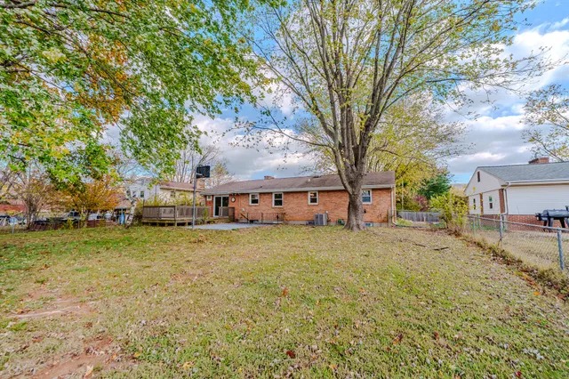a house with trees in front of it
