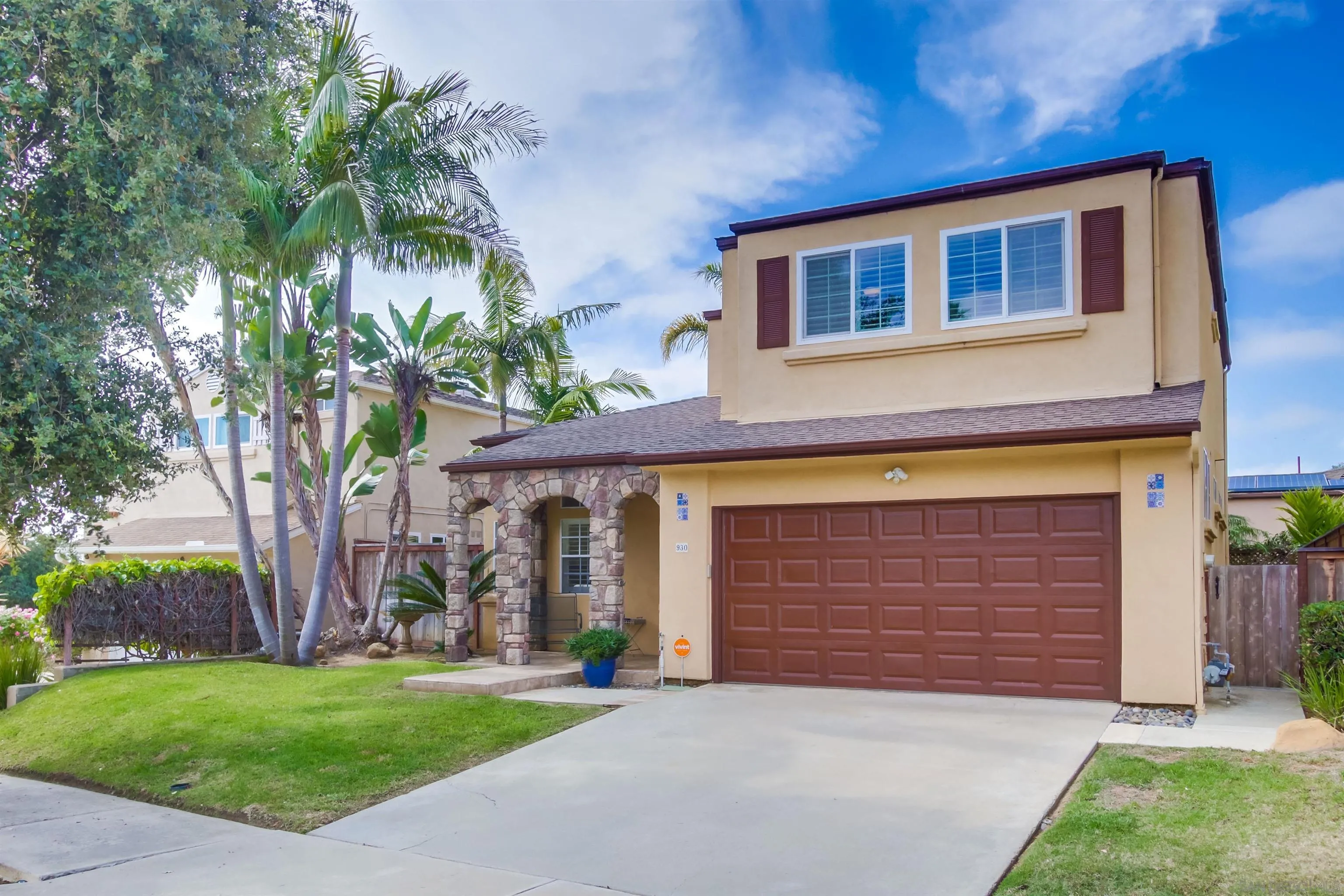 930 Gardena Road Encinitas, CA 92024 - Photo 2 of 27 a front view of a house with a yard and garage