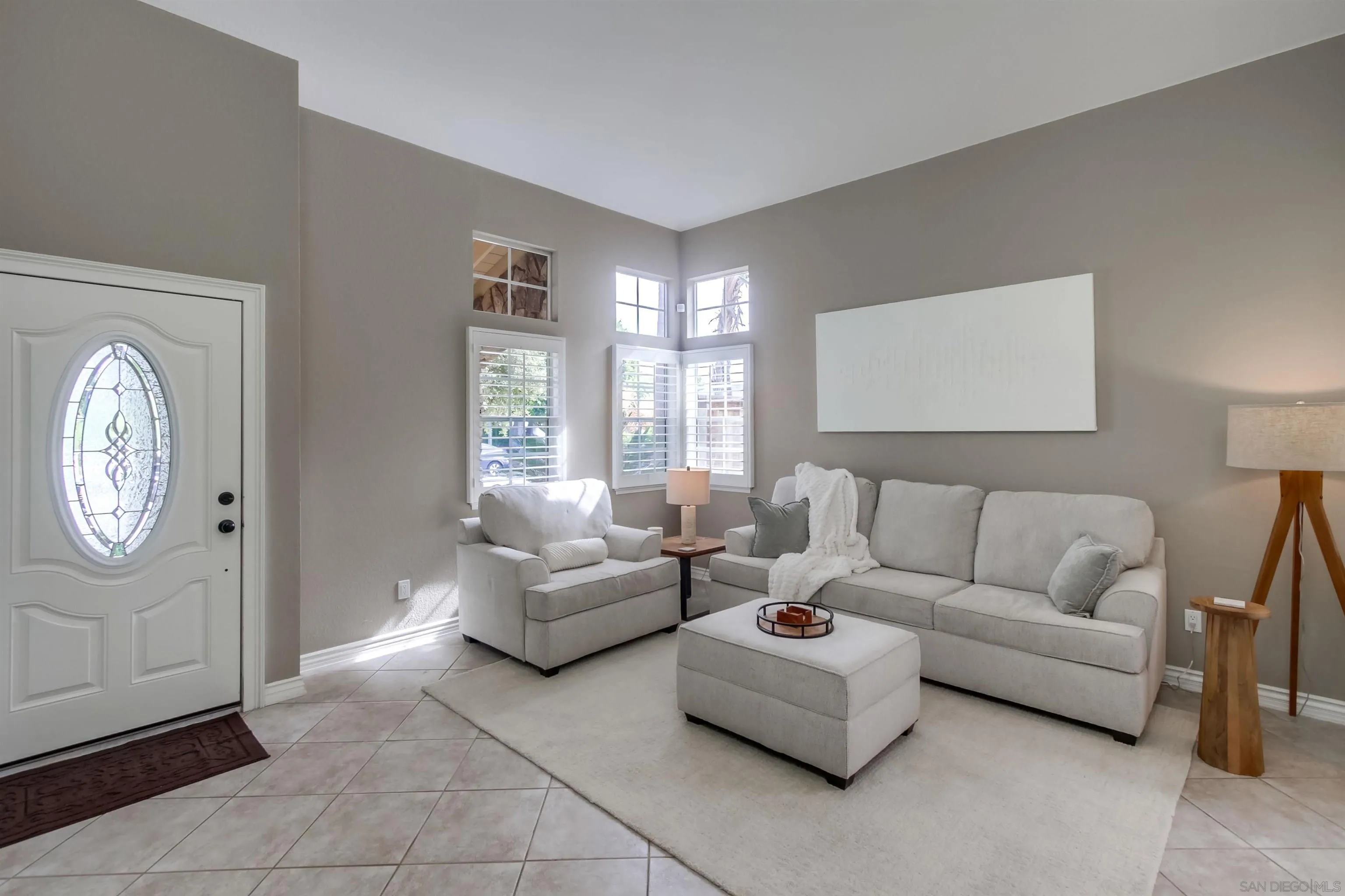 930 Gardena Road Encinitas, CA 92024 - Photo 5 of 27 a living room with furniture and a large window