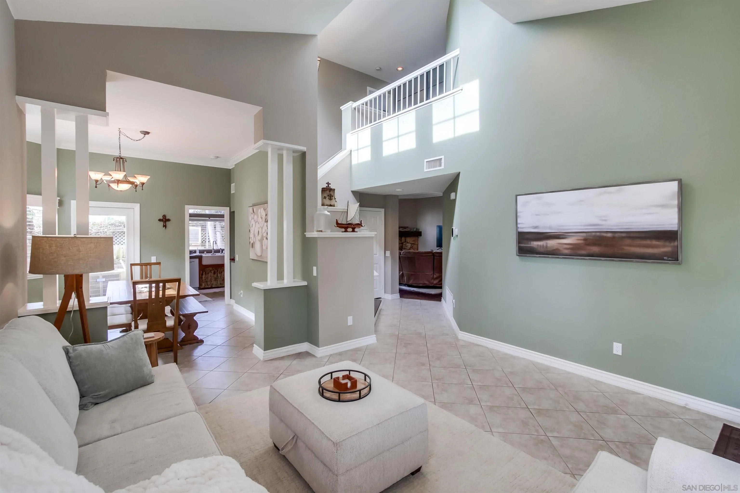 930 Gardena Road Encinitas, CA 92024 - Photo 6 of 27 a living room with furniture and a wooden floor