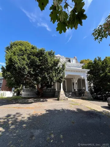 a view of house with outdoor space