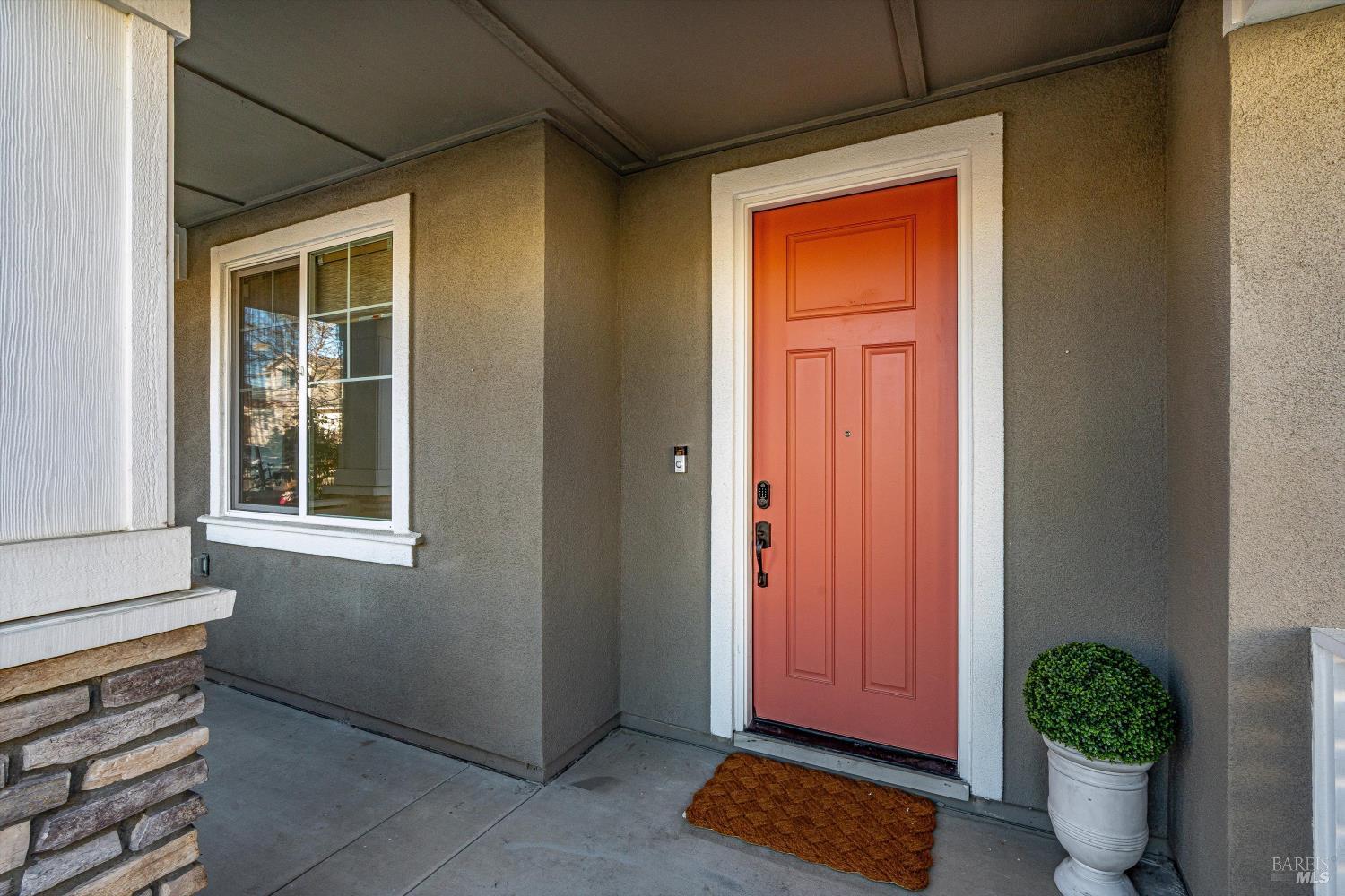 2560 Red Willow Drive Santa Rosa, CA 95403 - Photo 4 of 62 a window and a potted plant in front of a door