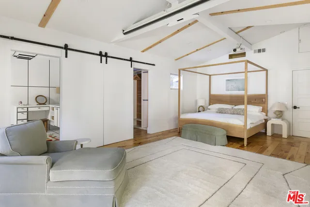 a kitchen with a sink cabinets and appliances