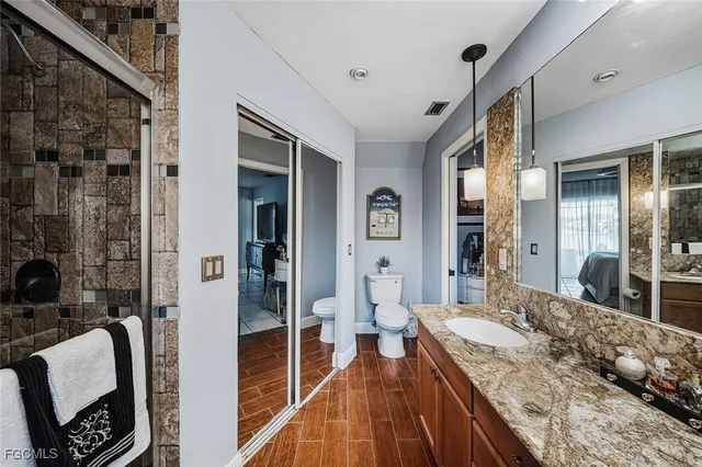 a living room filled with furniture and a large window