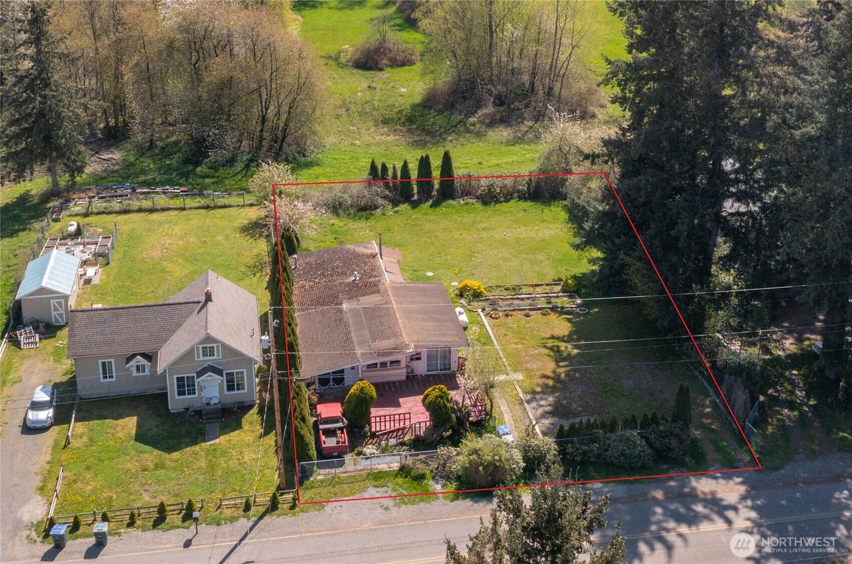 3051 Main Street Custer, WA 98240 - Photo 8 of 12 an aerial view of a house with a yard basket ball court and outdoor seating