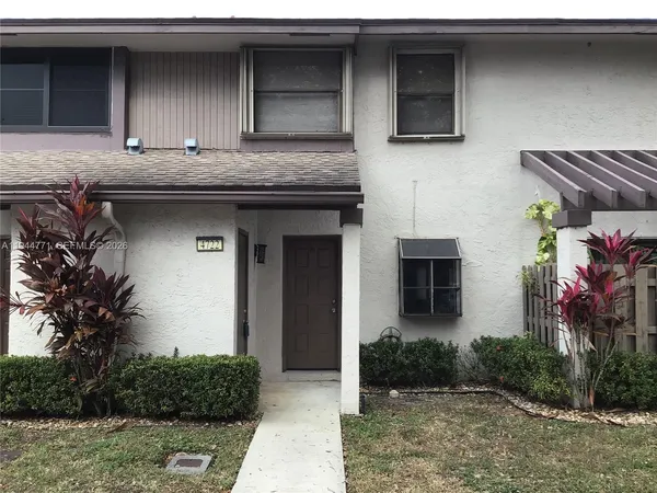 a front view of house with yard