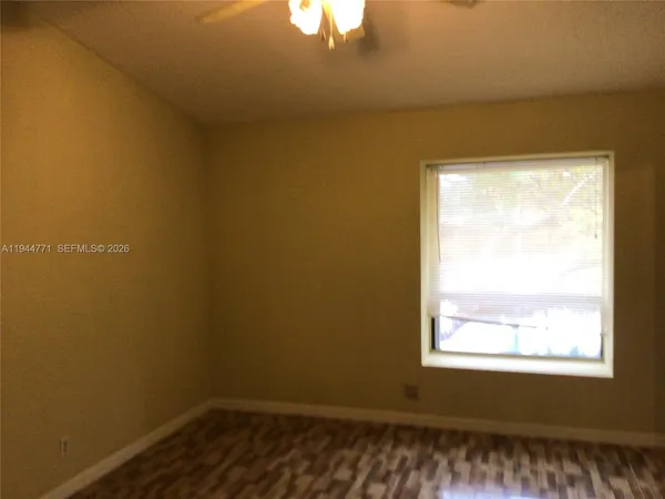 a view of a room that has a window