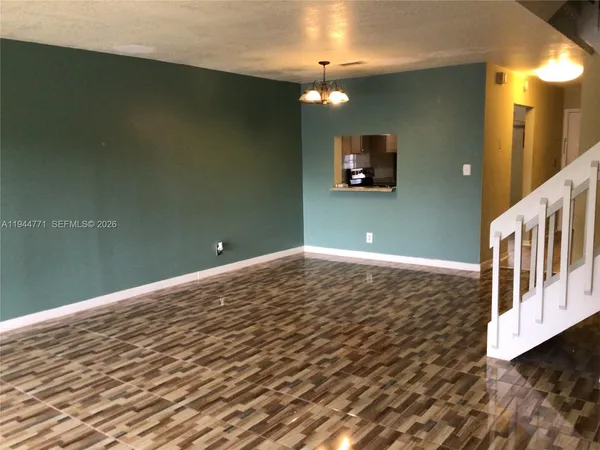 a view of a room with a fan