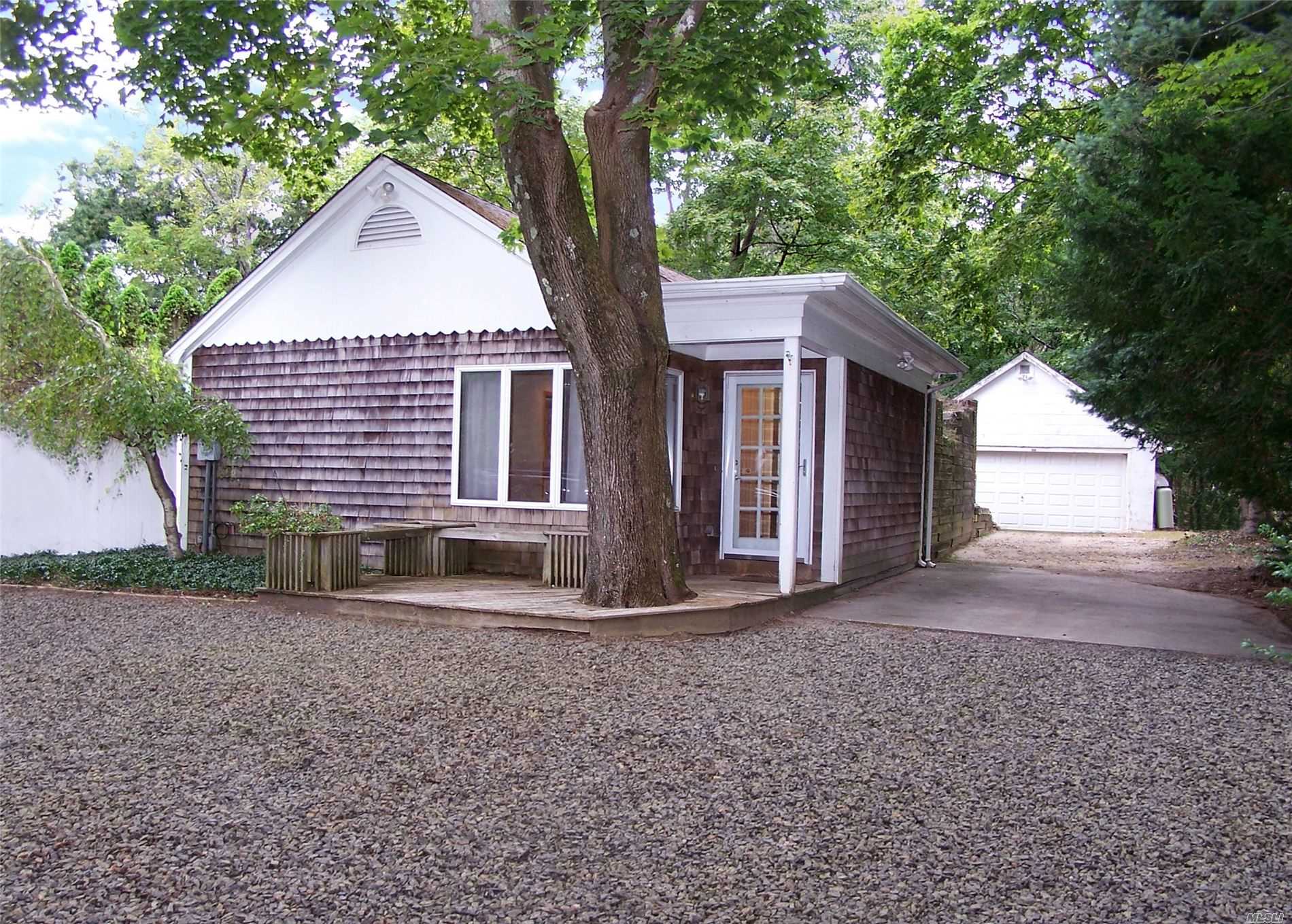 328 Terryville Road Port Jefferson Station, NY 11776 - Photo 1 of 1 a front view of a house with a yard