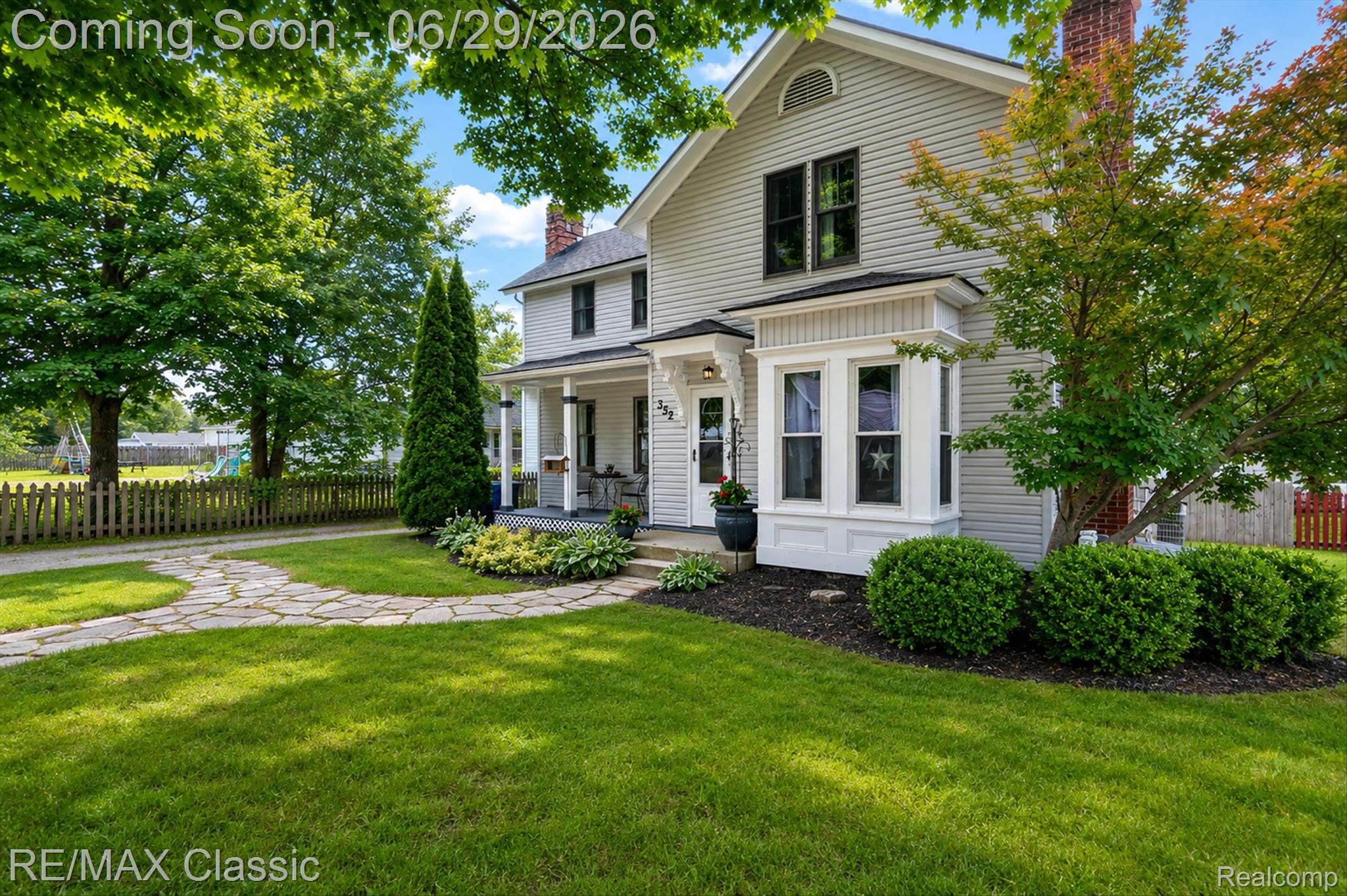 352 Meribah Road Highland, MI 48356 - Photo 1 of 39 Light gray siding exterior with black trim windows