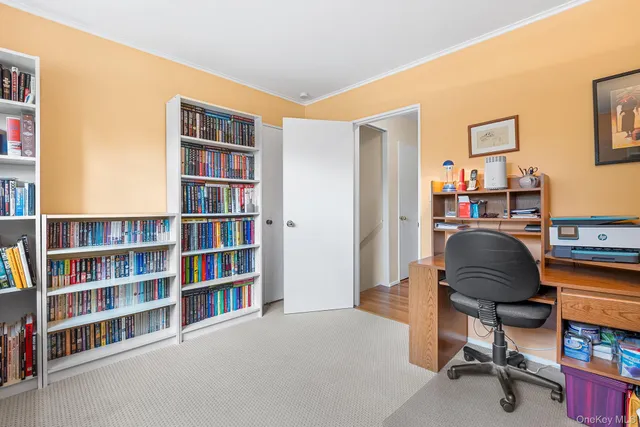 a workspace with a bookshelf