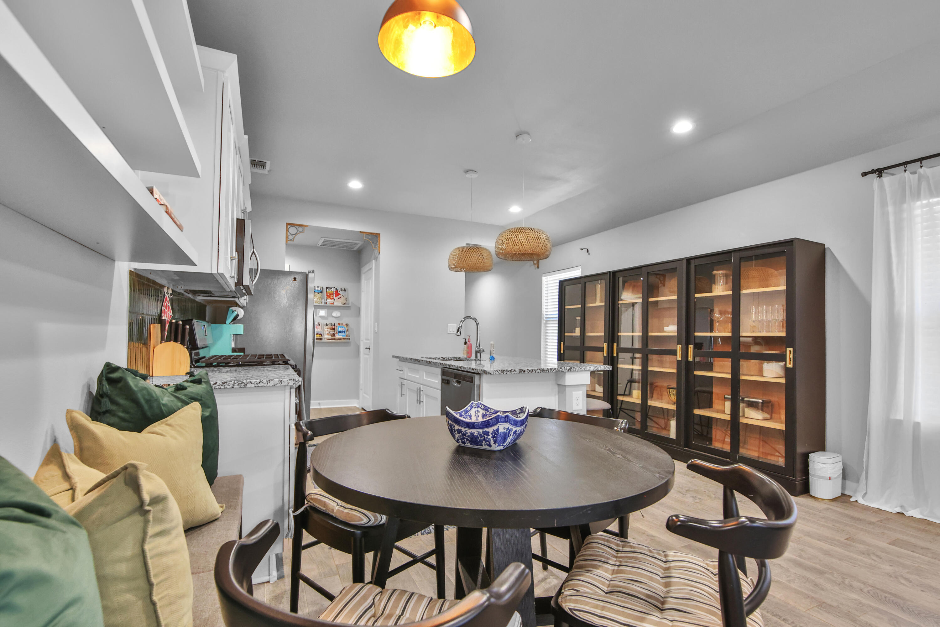 4613 126th Street Lubbock, TX 79424 - Photo 18 of 33 a view of a dining room with furniture and wooden floor