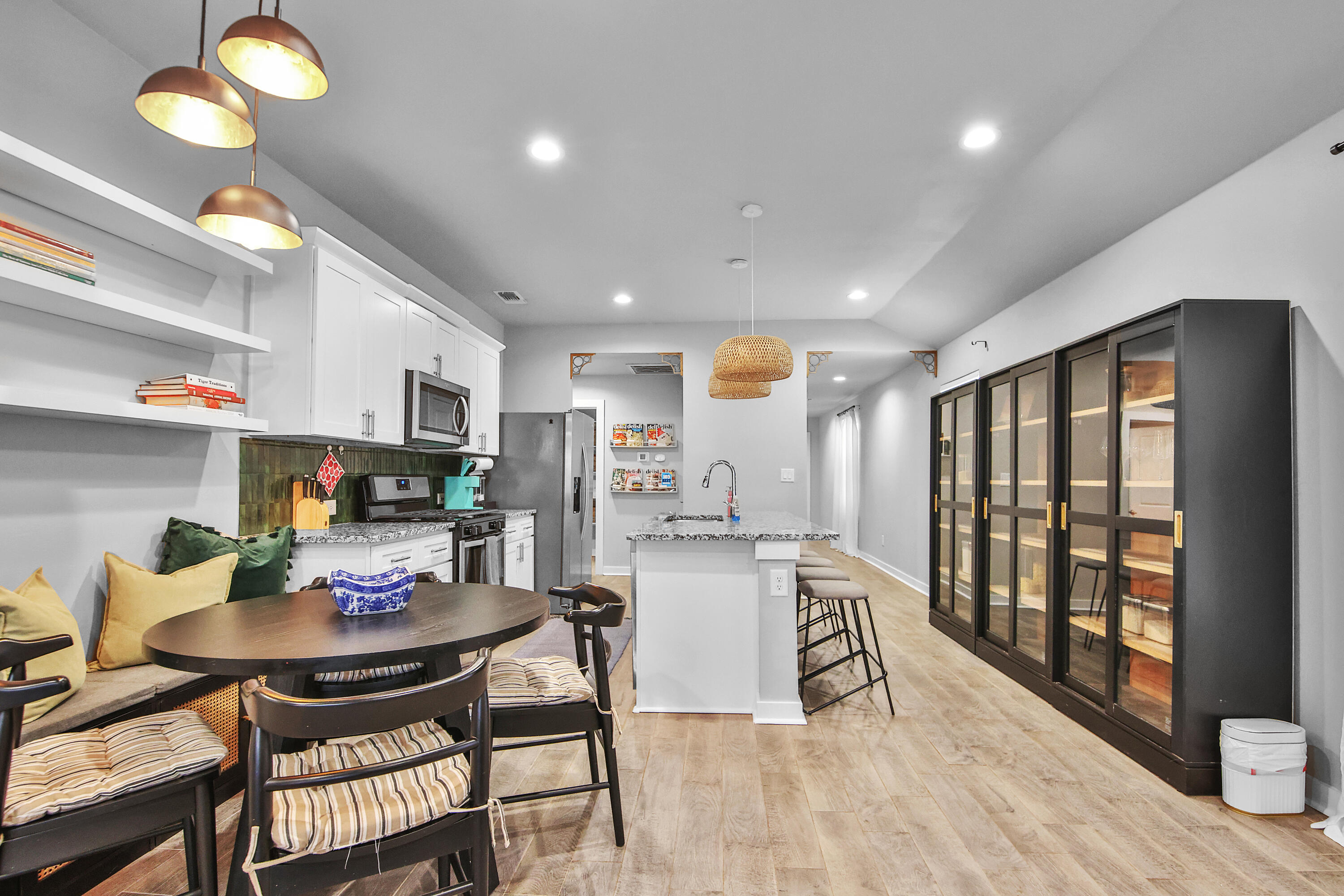 4613 126th Street Lubbock, TX 79424 - Photo 19 of 33 a view of a dining room with furniture and a potted plant