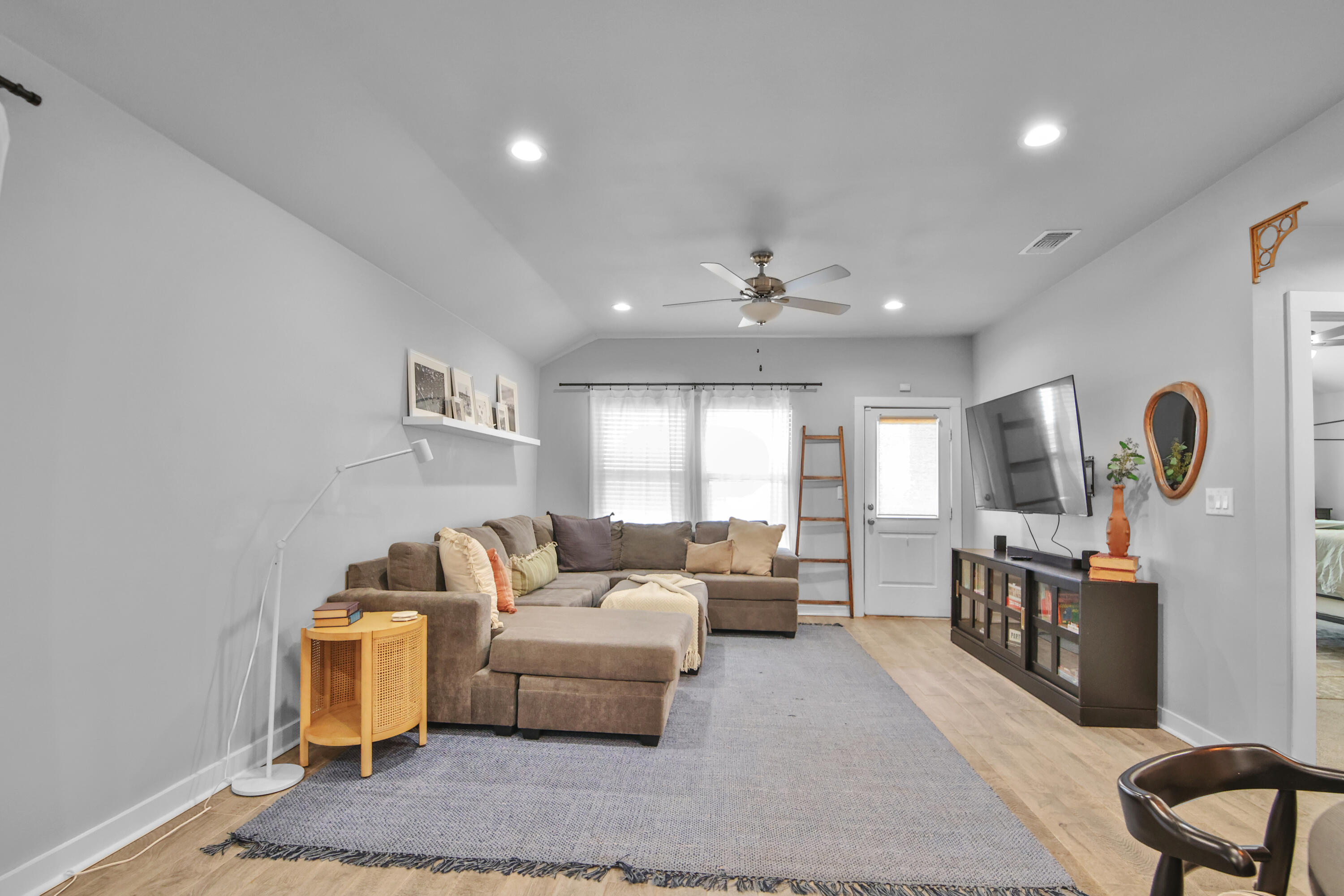 4613 126th Street Lubbock, TX 79424 - Photo 20 of 33 a living room with furniture and a window