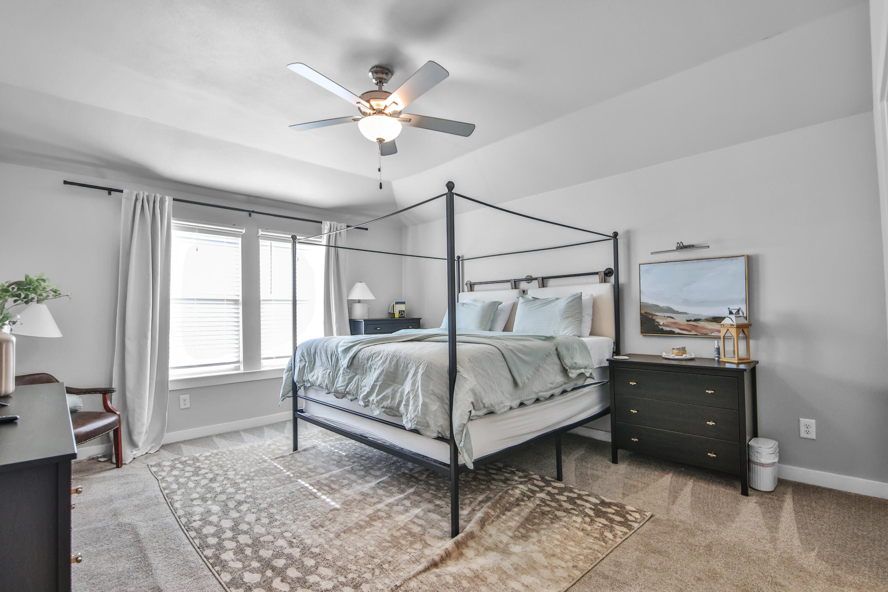 4613 126th Street Lubbock, TX 79424 - Photo 23 of 33 a bedroom with a bed and window