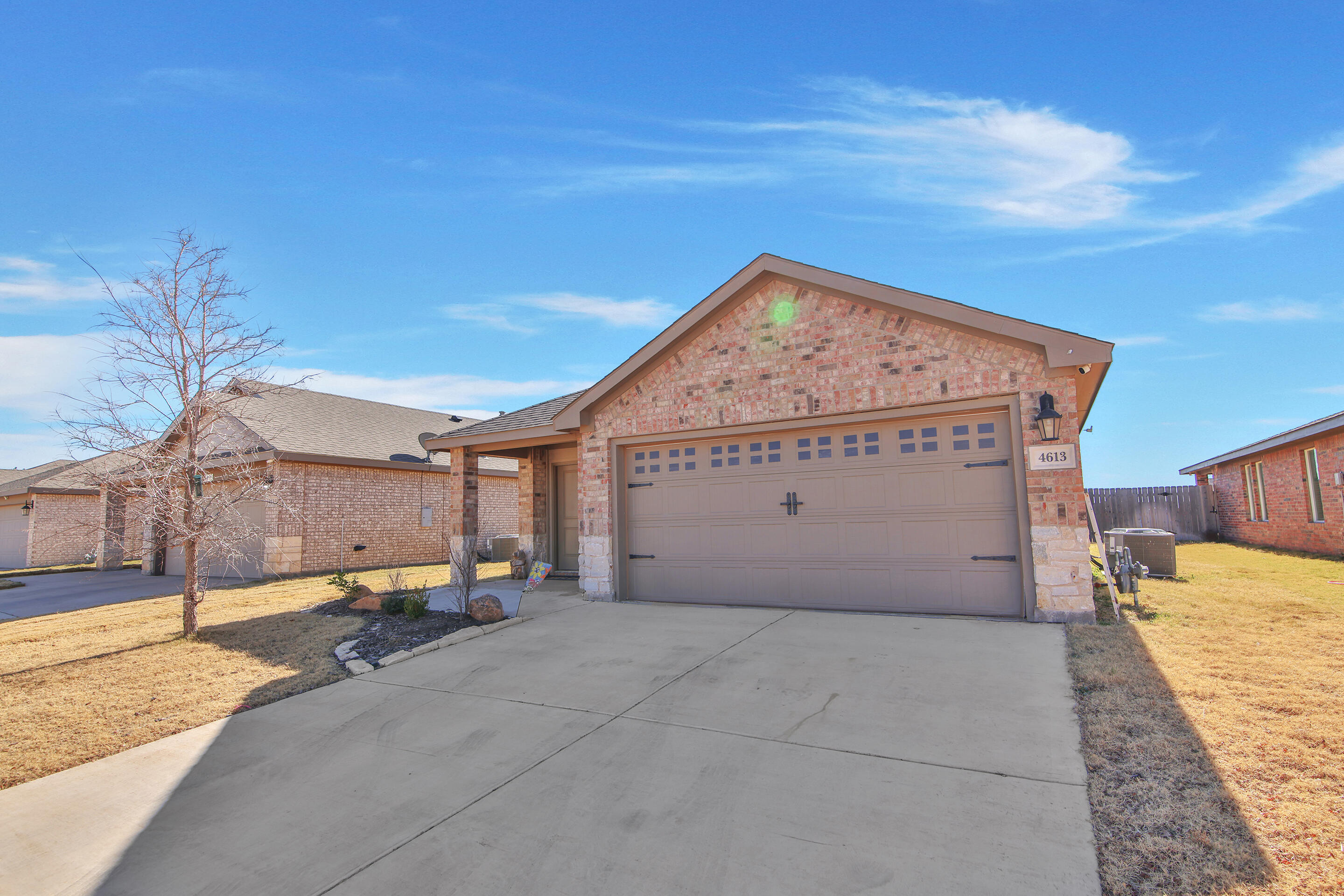4613 126th Street Lubbock, TX 79424 - Photo 3 of 33 a view of a outdoor space with a house