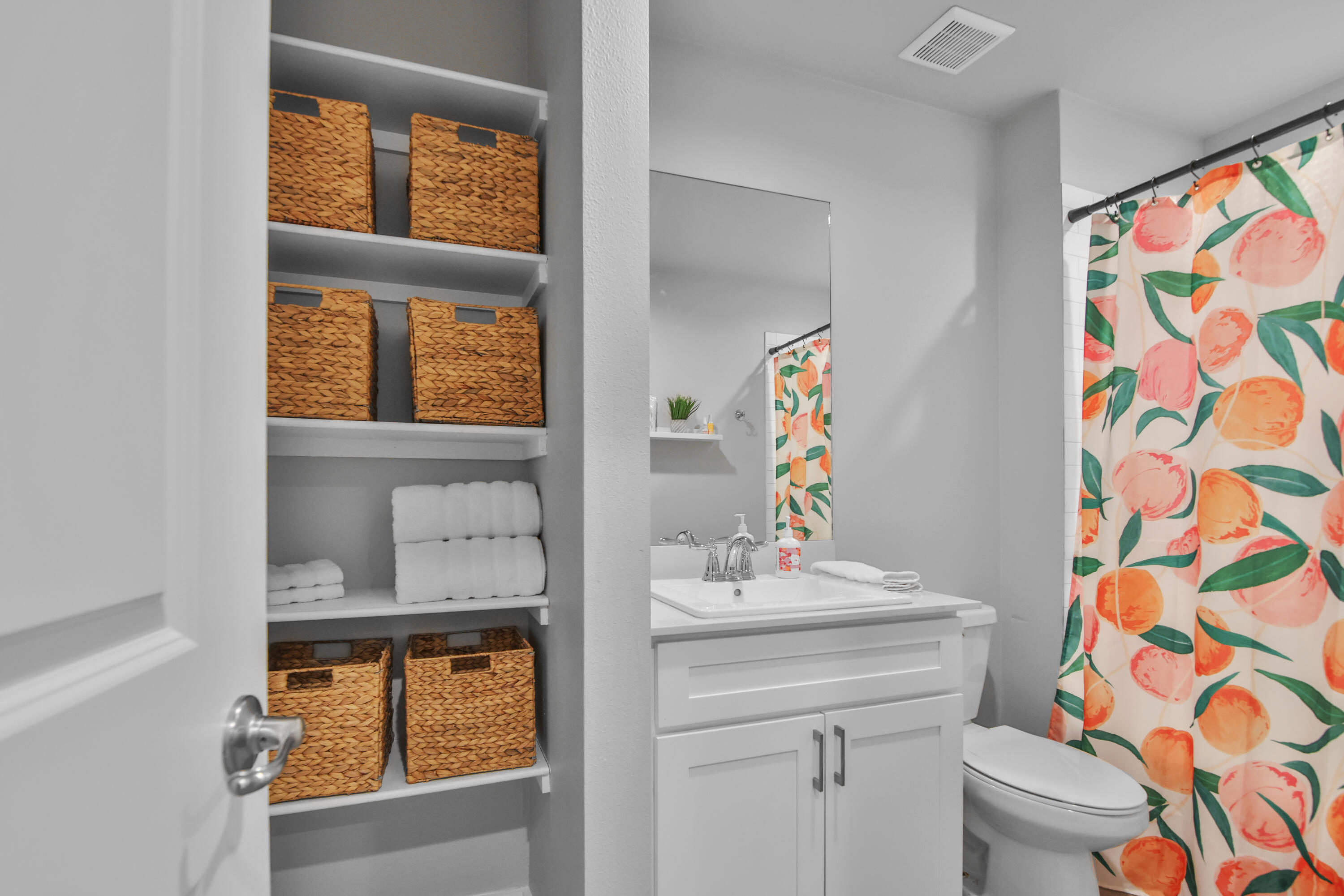 4613 126th Street Lubbock, TX 79424 - Photo 7 of 33 a bathroom with a sink a toilet and a window