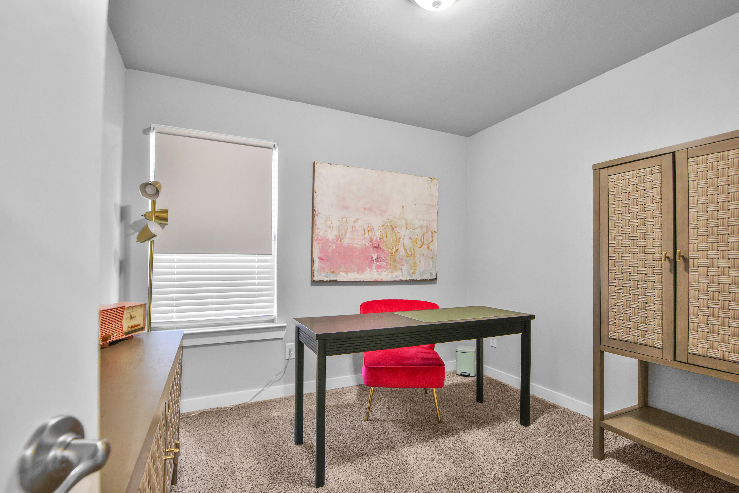 4613 126th Street Lubbock, TX 79424 - Photo 9 of 33 a view of a room with shelves