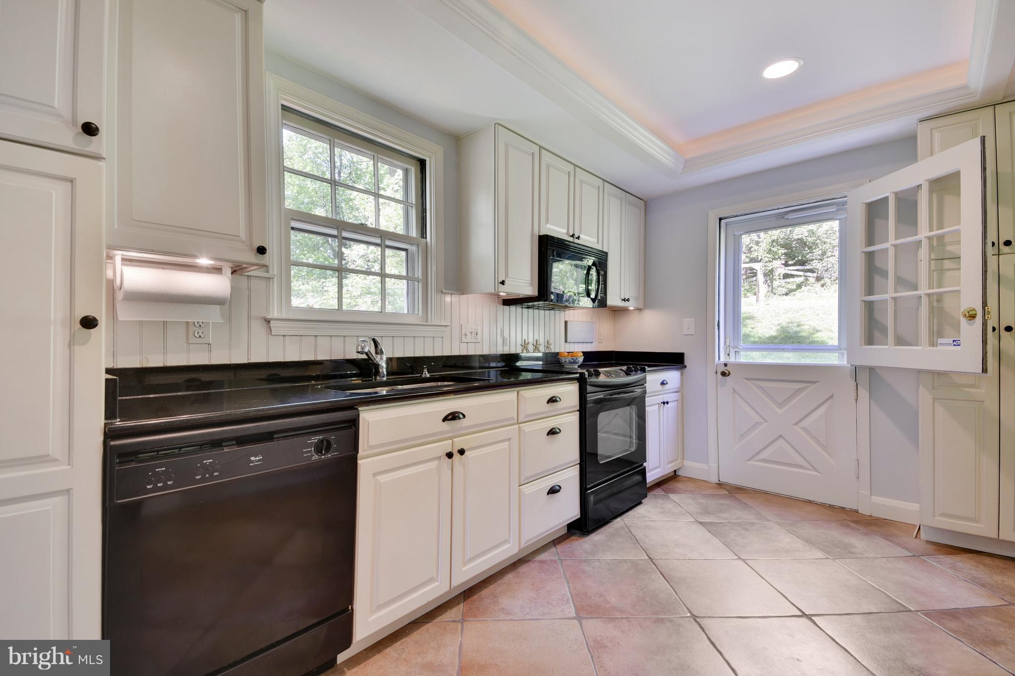 902 Navy Road Baltimore, MD 21204 - Photo 11 of 30 Kitchen opens to back yard