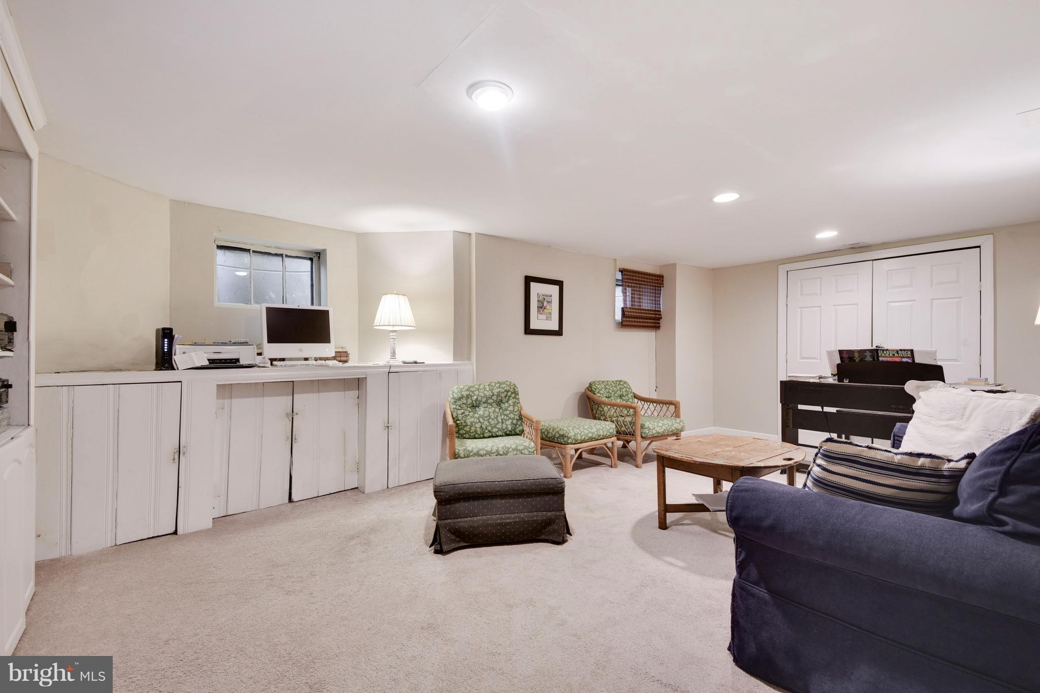 902 Navy Road Baltimore, MD 21204 - Photo 30 of 30 Downstairs rec room with built-ins