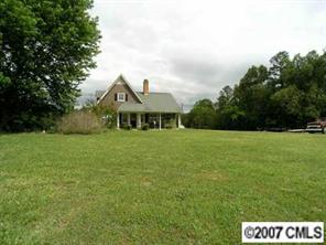 4870 Old Sapp Road Kannapolis, NC 28025 - Photo 2 of 8 a front view of a house with a yard