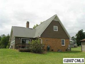 4870 Old Sapp Road Kannapolis, NC 28025 - Photo 8 of 8 a front view of a house with a garden
