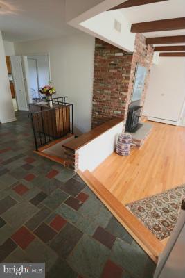 6429 Lignum Street Springfield, VA 22150 - Photo 13 of 29 a living room with hard wood flooring