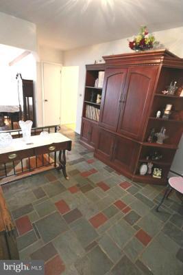 6429 Lignum Street Springfield, VA 22150 - Photo 3 of 29 a view of a workspace with furniture