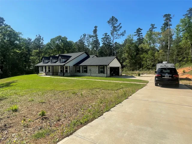 a view of an house with a swimming pool