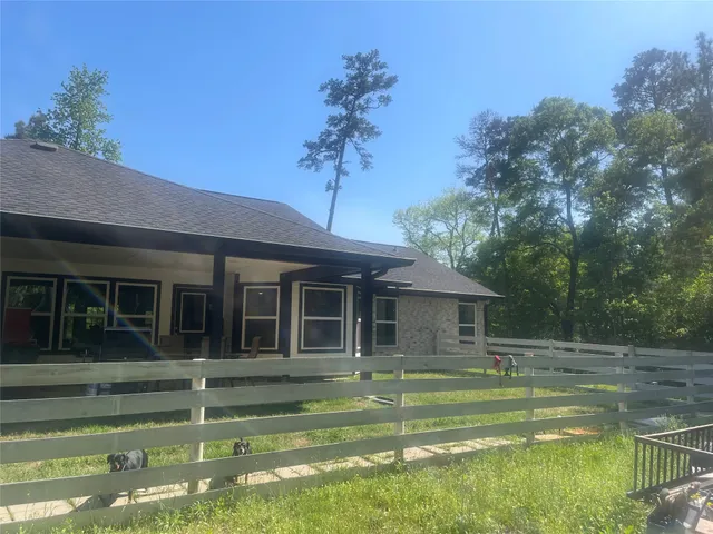 a view of a house with a swimming pool